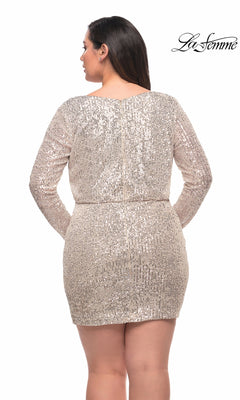 A woman is seen from the back wearing the La Femme Long Sleeve Plus Homecoming Dress 29396—a knee-length, fitted sequin dress in light gold with long sleeves, a subtle waistband, and the "La Femme" logo at the top right.