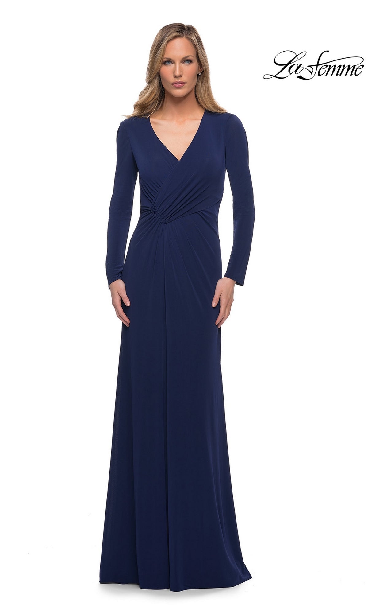 A woman wearing a La Femme 29535 long formal dress in navy, featuring a floor-length, long-sleeve design with a v-neckline and a gathered, ruched waist.