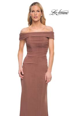 Woman modeling the mauve-brown Long Formal Dress: La Femme 29541 with off-the-shoulder, ruched fitted bodice; “La Femme” logo shown upper right on plain white background.