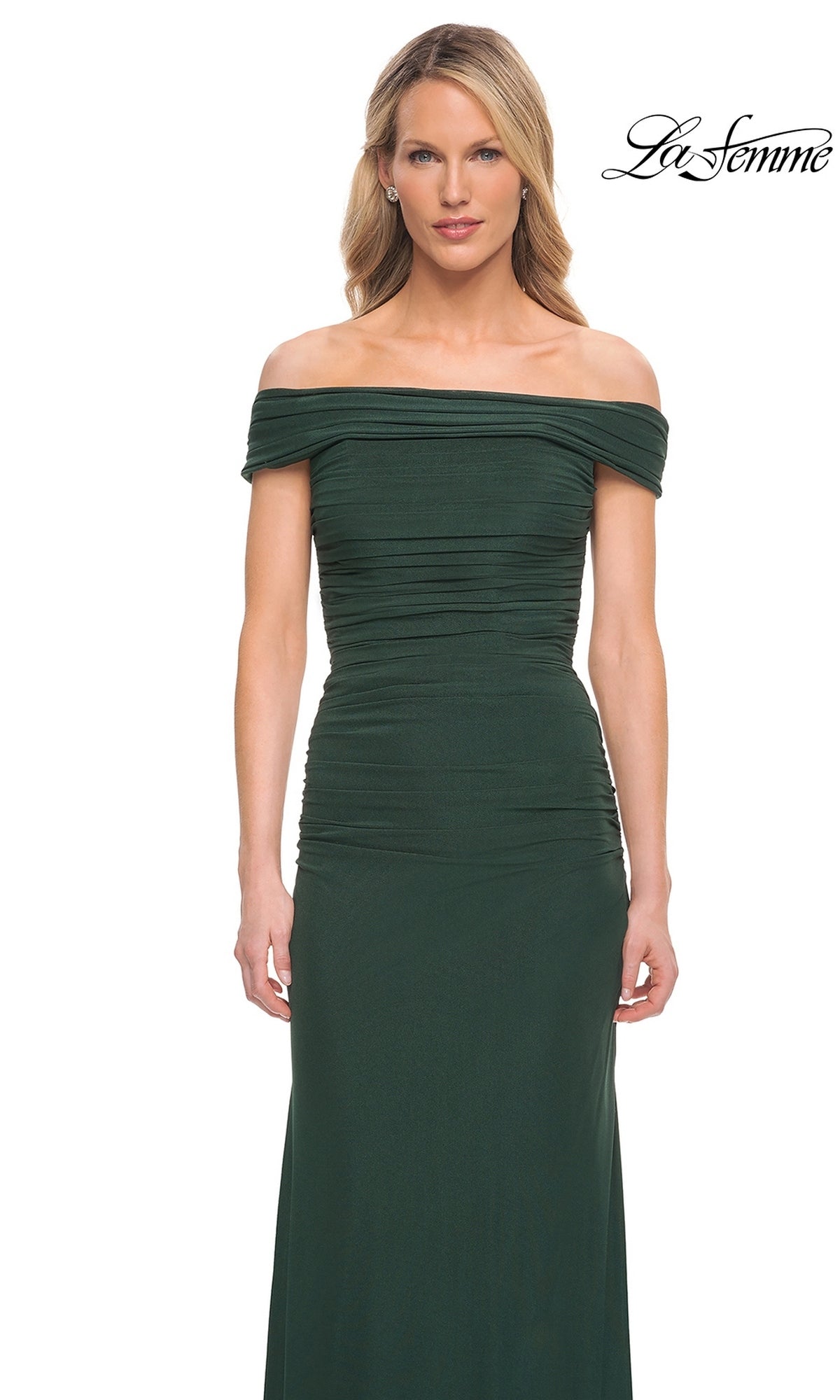 Woman wearing Long Formal Dress: La Femme 29541 in dark green with a ruched fitted bodice, posing against a plain white background.