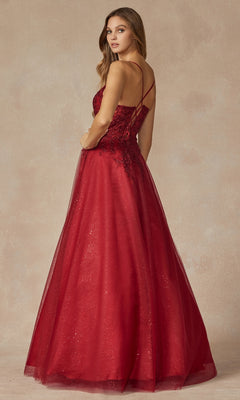 A woman poses in the Juliet 295 Lace-Up Long A-Line Prom Dress, featuring a floor-length red design with a fitted bodice, embroidered floral details, and delicate spaghetti straps against a neutral background.