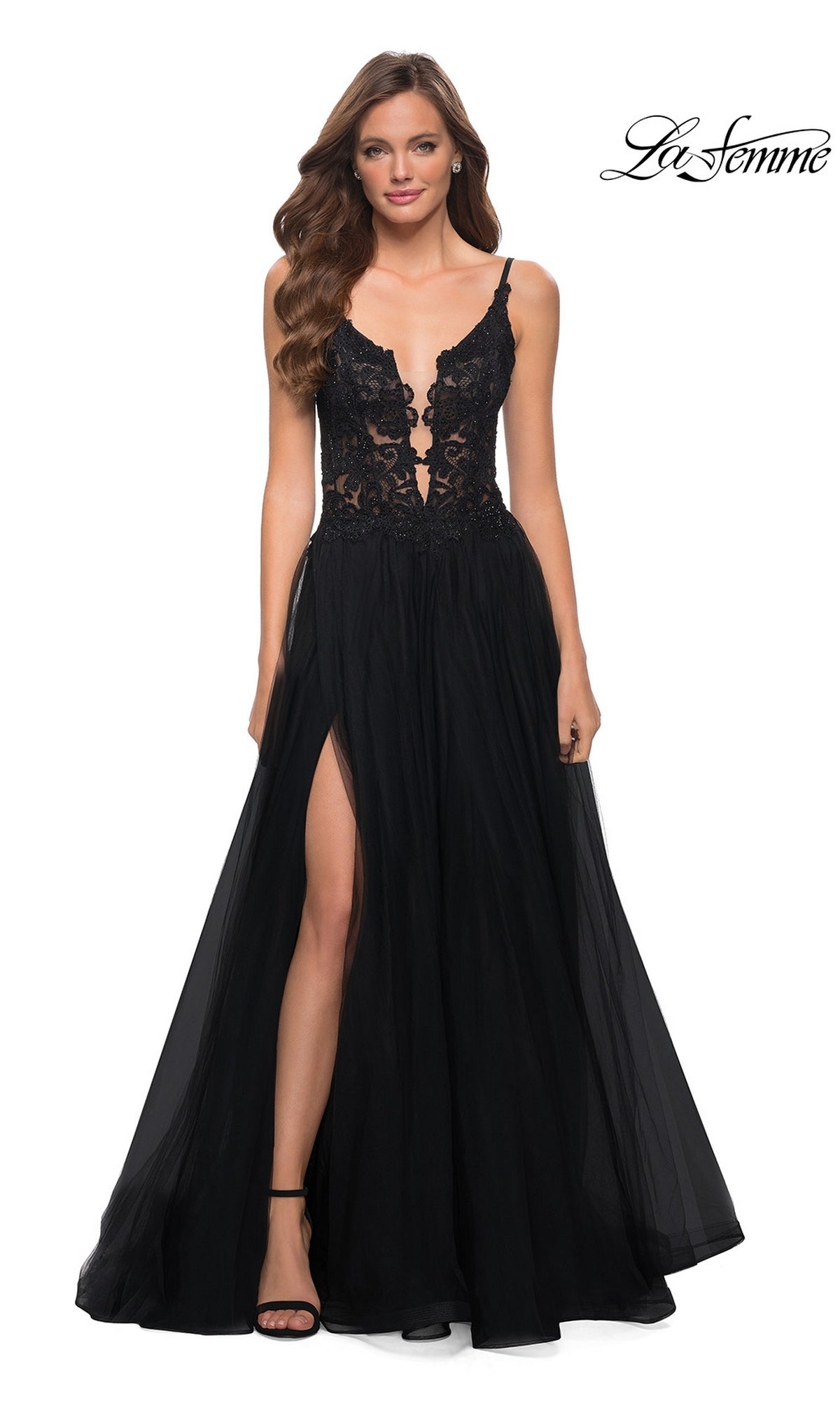 Woman in a black La Femme Lace-Bodice Long A-Line Prom Dress 29686 featuring a deep V-neckline, embroidered lace bodice, thin straps, and high-slit skirt; 