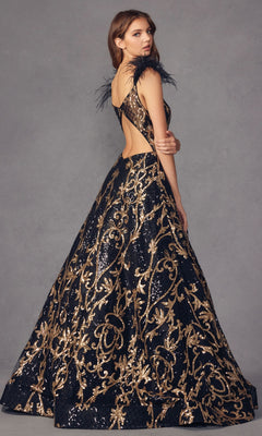 A woman stands against a plain gray background wearing the Feathered-Cap-Sleeve Long Sequin Prom Ball Gown 297, featuring a long black silhouette with gold accents, sequin details, an open back, and feathered cap sleeves.