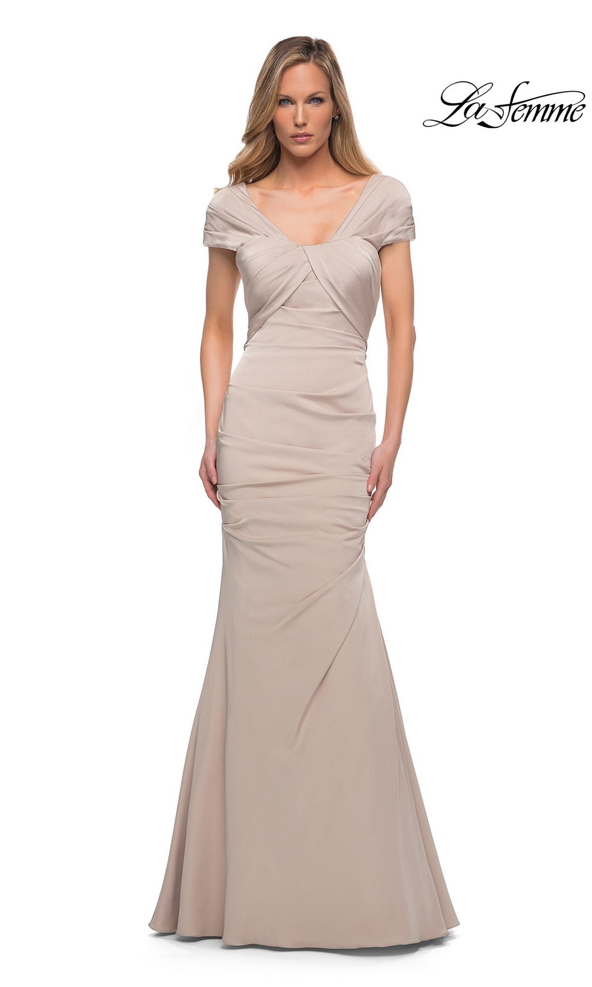 La Femme 29805 nude long formal dress featuring a V-neckline, cap sleeves, draped bodice, and a trumpet silhouette.