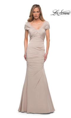 La Femme 29805 nude long formal dress featuring a V-neckline, cap sleeves, draped bodice, and a trumpet silhouette.