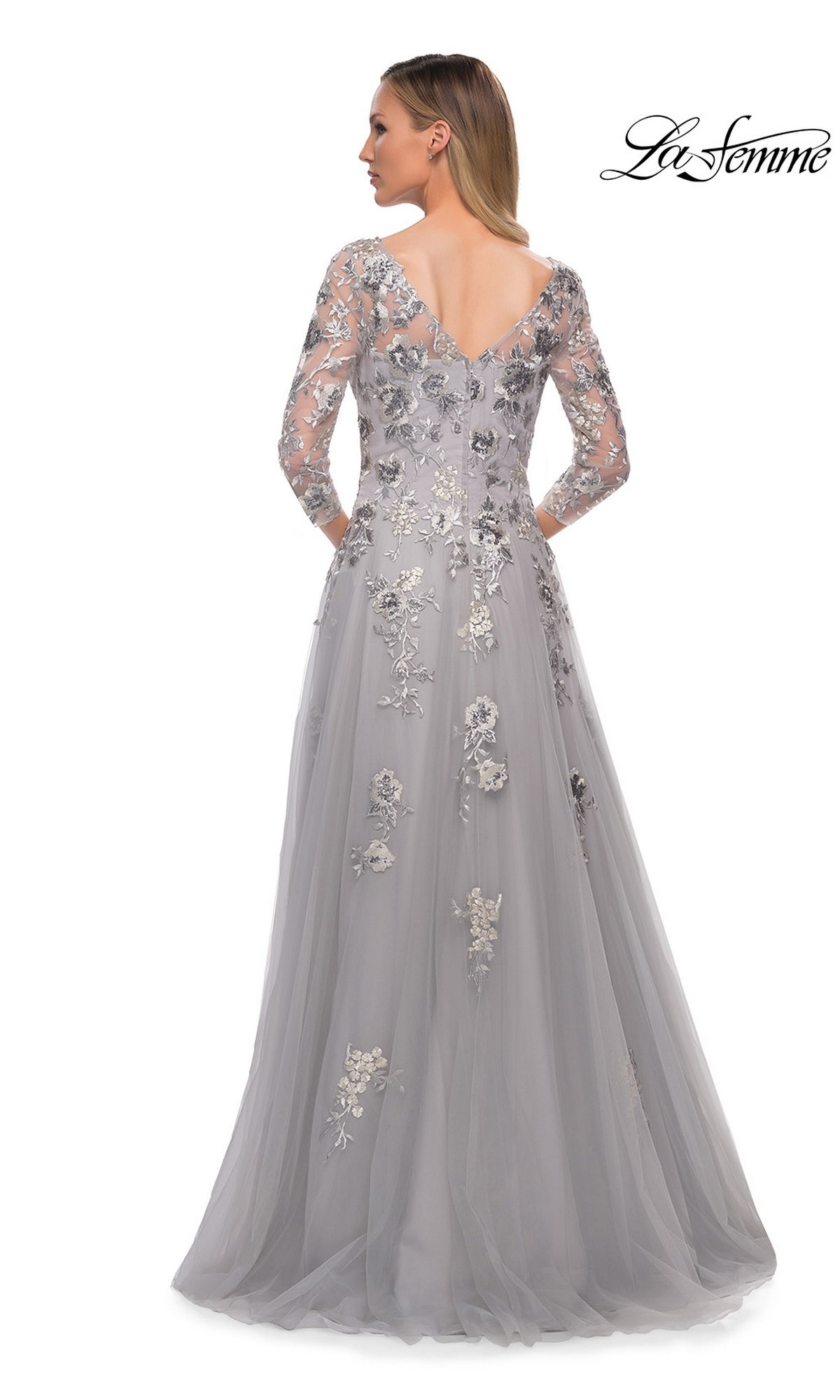 Woman shown from the back wearing Long Formal Dress: La Femme 29825—light gray tulle, sheer sleeves, floral embroidery—ideal for mother of the bride.