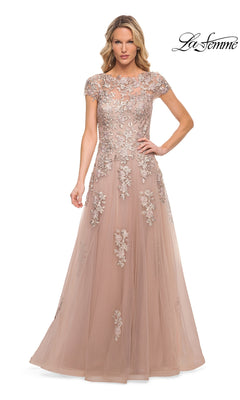 A blush-colored, floor-length La Femme 29829 formal dress with cap sleeves and floral lace appliques on the bodice.