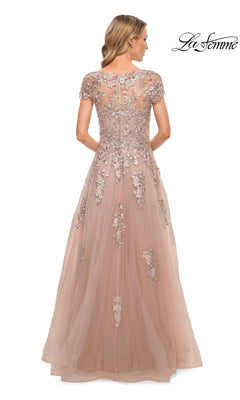 Back view of a floor-length dusty rose La Femme 29829 formal dress with cap sleeves and floral lace appliques on the bodice and skirt.