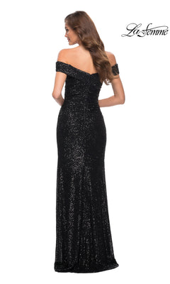 A woman with long hair down is shown from the back wearing the La Femme Long Prom Dress 29831—an off-the-shoulder, floor-length sequin gown. The "La Femme" logo appears in the top right corner.