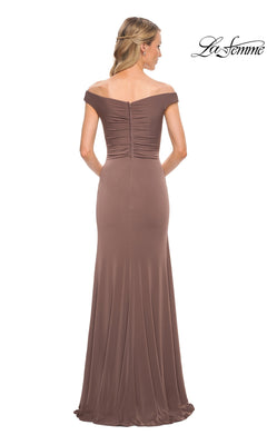 Back view of a woman wearing a La Femme 29925 floor-length, ruffled off-the-shoulder formal gown with a ruched bodice.