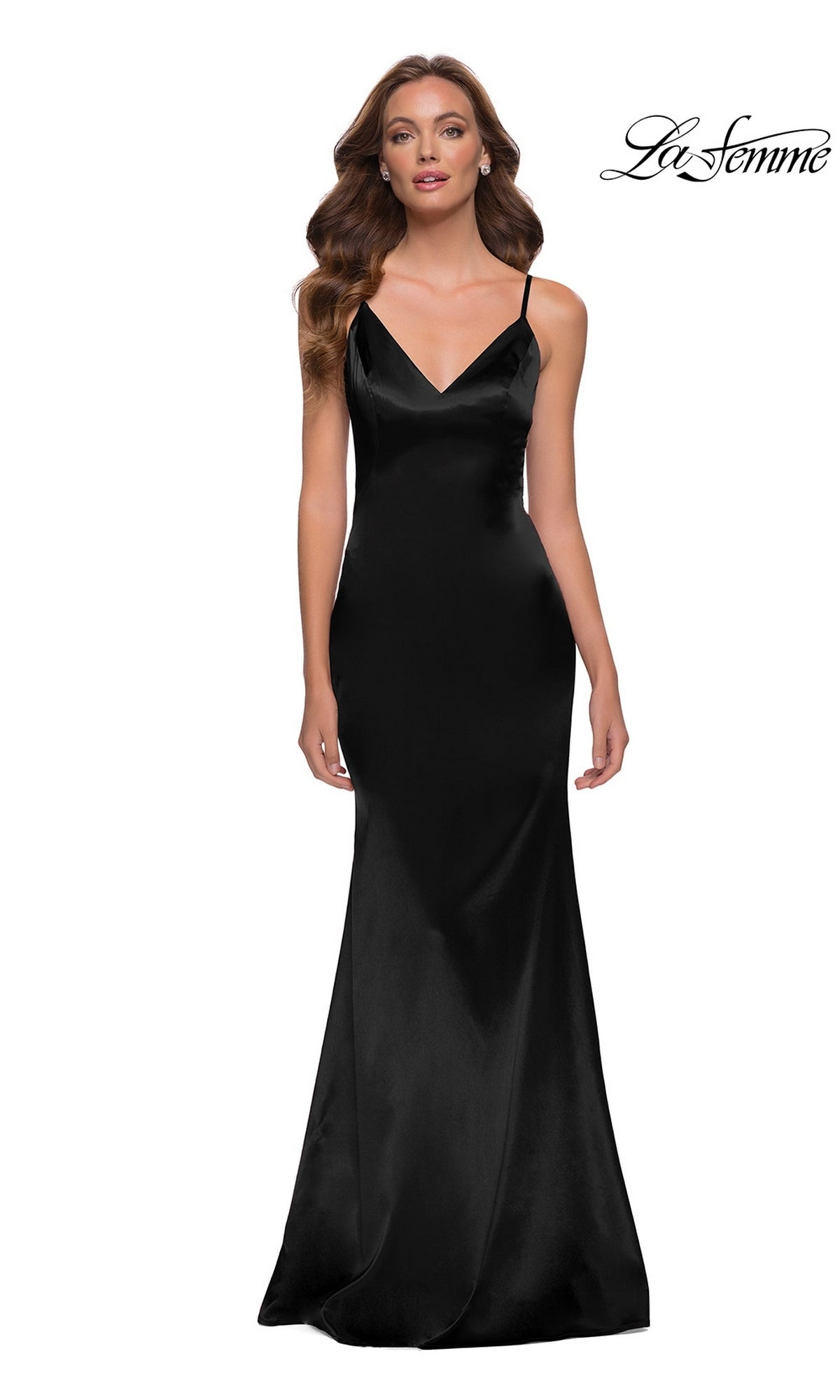 Model wears floor-length Long Prom Dress: La Femme 29960 in black, featuring thin straps, a fitted bodice, and a sheath skirt. “La Femme” logo in top right corner.