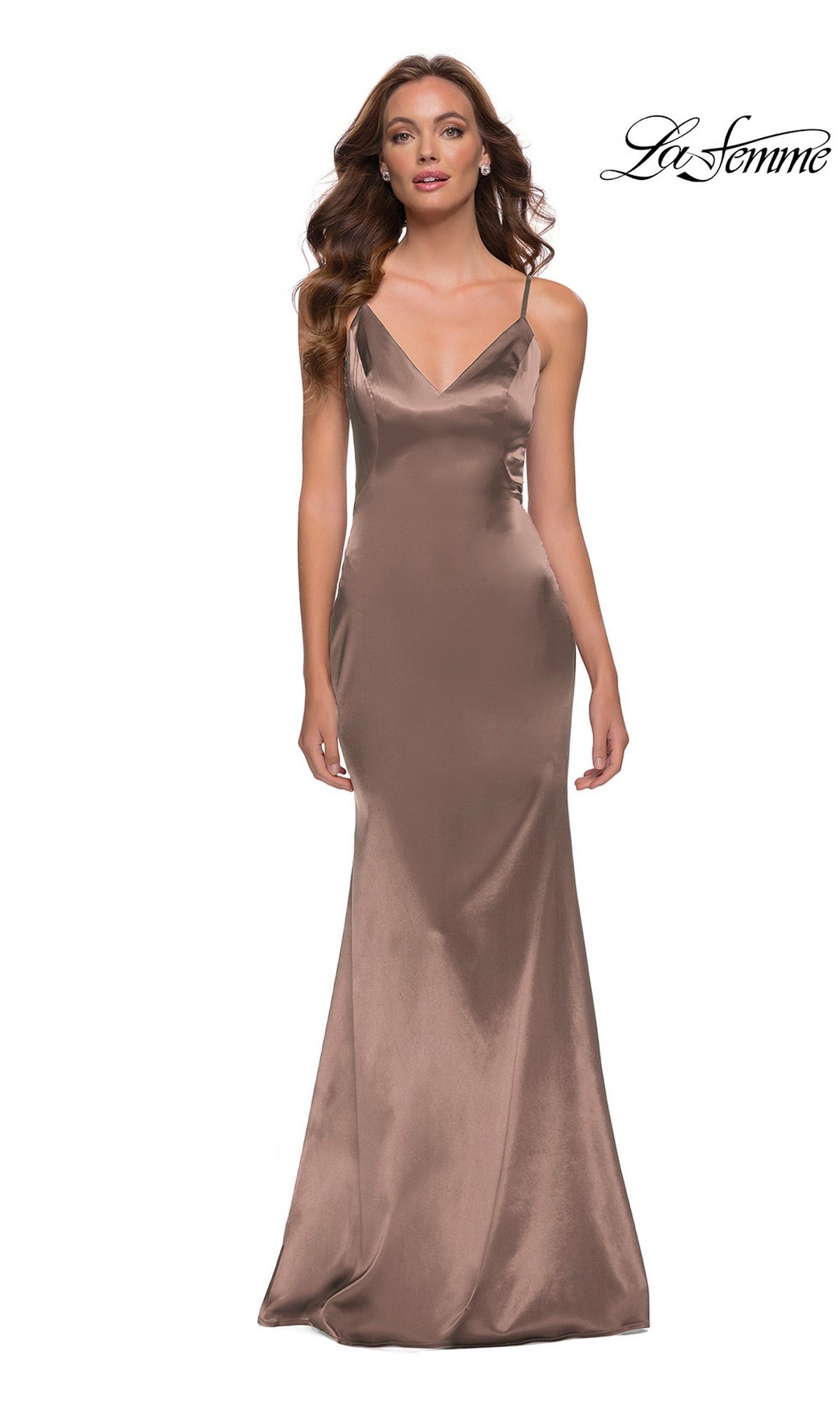 Woman in a nude Long Prom Dress: La Femme 29960, featuring a sleeveless fitted sheath silhouette, poses against a white backdrop with the “La Femme” logo in the top right.