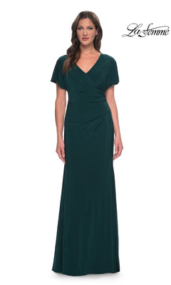 La Femme 29997 long, dark green floor-length jersey formal dress with a V-neckline, short flutter sleeves, and ruched detailing at the waist.