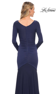 Back view of a navy blue Long Formal Dress: La Femme 30010 featuring a ruched bodice and a flared skirt.