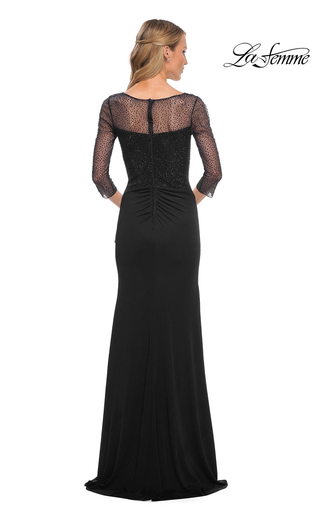 Woman facing away in Long Formal Dress: La Femme 30028, featuring sheer beaded applique sleeves and back. “La Femme” logo in corner.