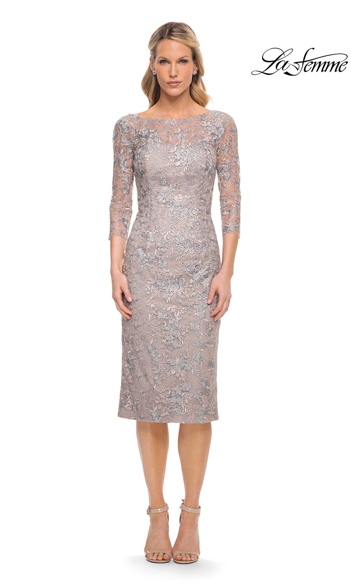 A woman wears a mauve and silver La Femme 30036 midi wedding guest dress, featuring a sheath silhouette, three-quarter sleeves, a boat neckline, and embellished embroidered floral detailing.