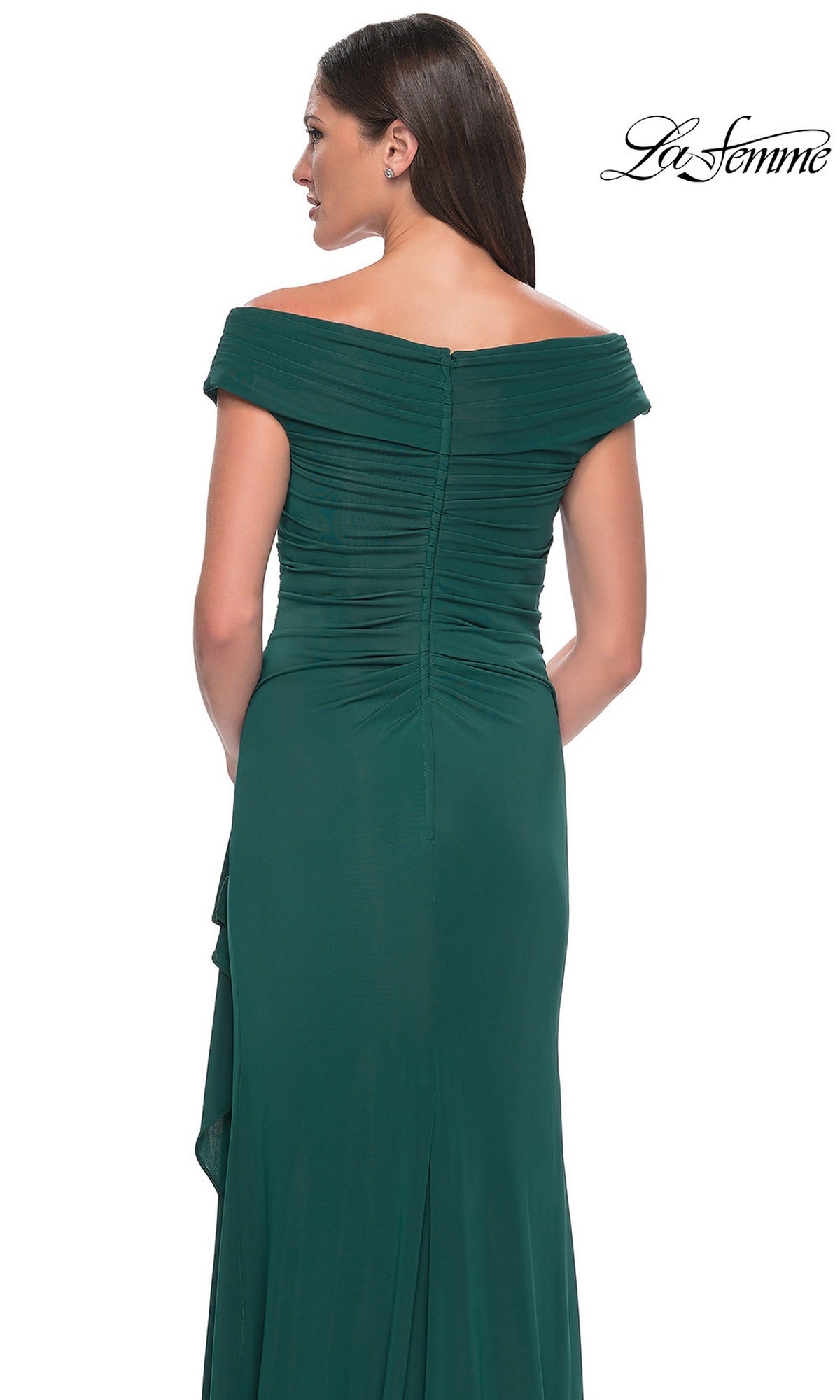 Woman in a dark green off-shoulder V-neck, floor-length ruched gown (Long Formal Dress: La Femme 30040), viewed from behind; “La Femme” logo top right.