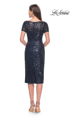 Back view of a navy Knee Length Wedding Guest Dress: La Femme 30043, featuring short sleeves, a sheer neckline, and all-over bead embellishment.