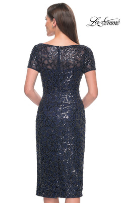 Back view of the Knee Length Wedding Guest Dress: La Femme 30043, a navy knee-length sequin sheath dress with short sleeves and an all-over pattern.