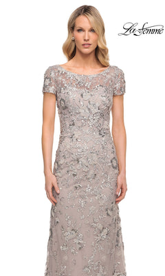 La Femme 30053 floor-length taupe sheath evening gown featuring a boat neckline, short sleeves, and intricate silver floral beadwork.