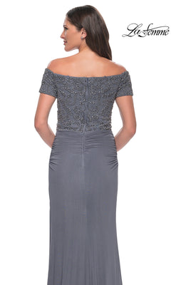 Woman modeling Long Formal Dress: La Femme 30057, featuring an off-the-shoulder beaded bodice and floor-length skirt; La Femme logo shown top right.