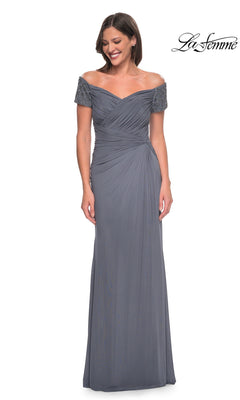 Woman wearing Long Formal Dress: La Femme 30057—off-the-shoulder beaded short sleeves, slate gray, floor length. “La Femme” logo in top right on white background.