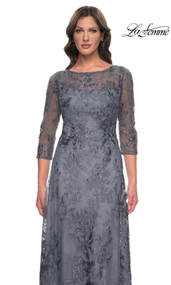 La Femme 30060 floor-length slate grey lace formal dress with a boat neckline, three-quarter length sleeves, and intricate floral embroidery.