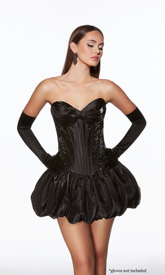 A woman models the Alyce 30083 short homecoming dress, a strapless black design with a satin corset bodice and bubble skirt. She also wears long black gloves (gloves not included).