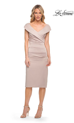 The La Femme 30110 midi wedding guest dress in frost rose is a light pink midi dress with a fold-over V-neckline, cap sleeves, and a fitted sheath skirt.