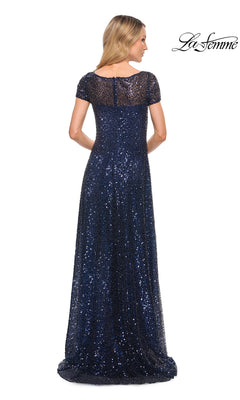 Back view of a woman in a Long Formal Dress: La Femme 30122, a modest floor-length navy blue sequin gown with short sleeves and a sheer neckline.
