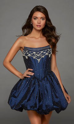 A woman wearing the Alyce 30124 short homecoming dress in Midnight stands against a plain gray background. The strapless dress is adorned with sparkling rhinestone embellishments and features a flattering fit-and-flare silhouette, making it the perfect choice for standing out at any special event.