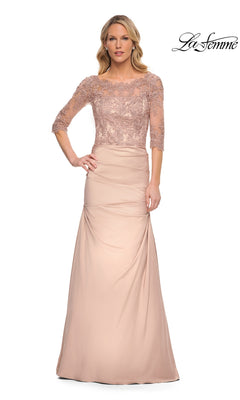Woman wearing La Femme 30162, a blush pink long formal dress with lace bodice, three-quarter sleeves, and floral details—perfect for a mother-of-the-bride look.