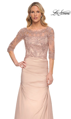 Woman in Long Formal Dress: La Femme 30162—light pink, floor-length gown with lace bodice and 3/4 sleeves. “La Femme” logo top right.