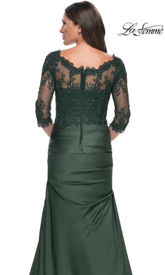 Woman in the Long Formal Dress: La Femme 30162, featuring a lace bodice and sheer beaded back—an elegant mother-of-the-bride choice.