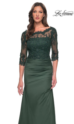 Woman wearing a dark green Long Formal Dress: La Femme 30162 with lace and bead bodice, three-quarter sleeves; “La Femme” logo in the top right corner.