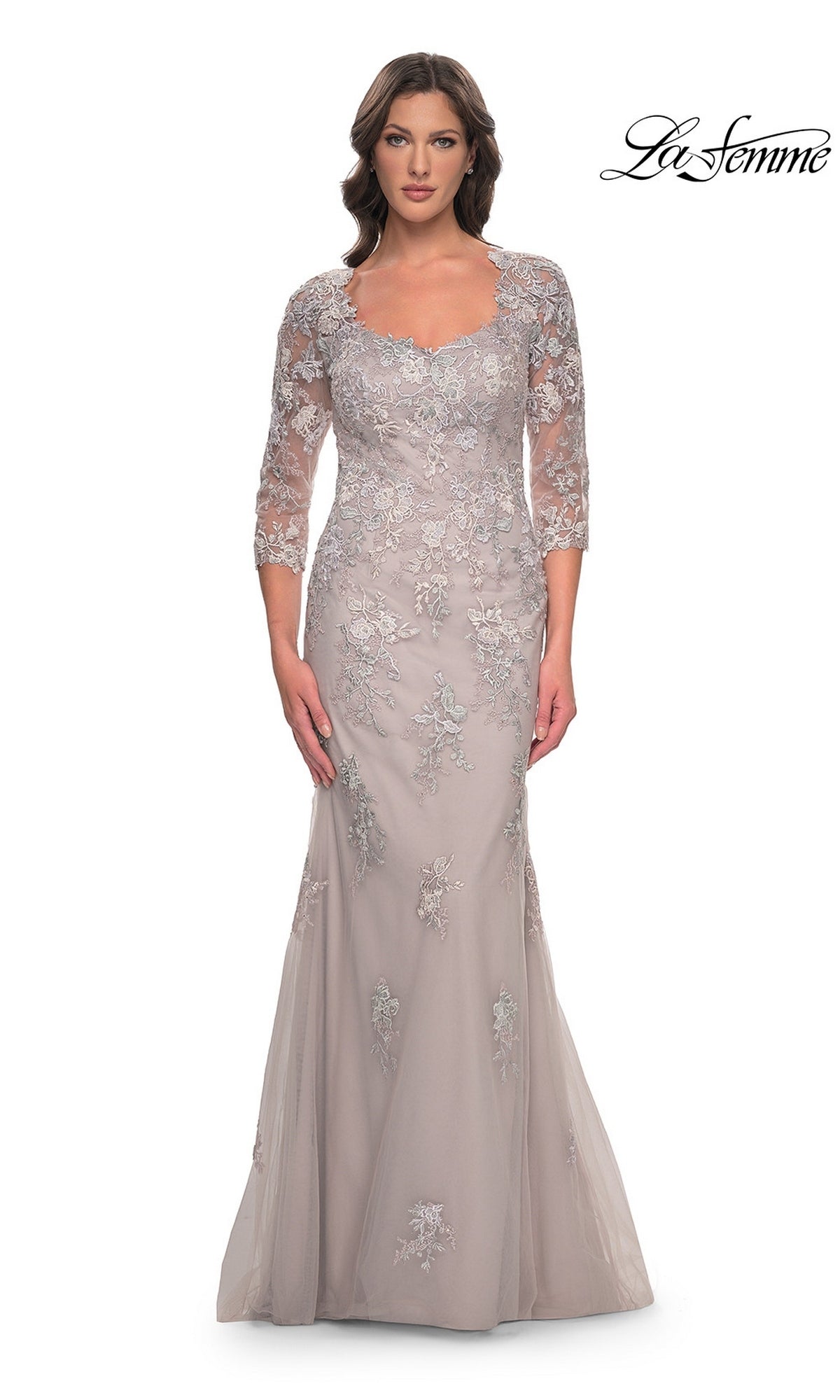 The La Femme 30200 long formal dress in dusty lilac features three-quarter length lace sleeves, a scoop neckline, and lace appliques overlaying the bodice and mermaid skirt.
