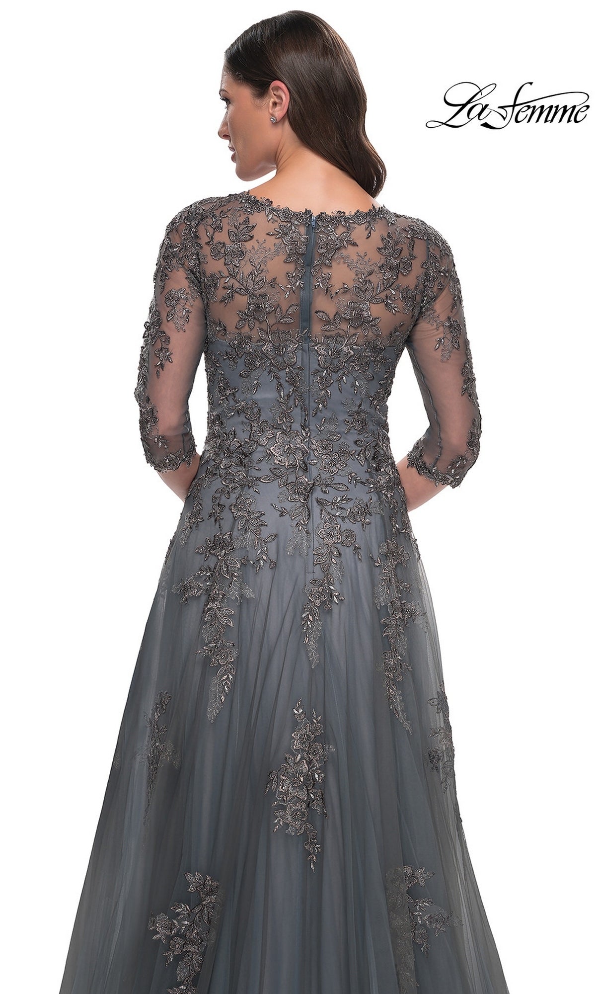 Back view of the grey Long Formal Dress: La Femme 30201, featuring three-quarter sleeves and ornate metallic floral embroidery on the bodice and skirt.