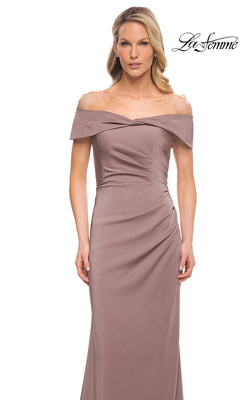 The La Femme 30397 is a floor-length, cocoa satin off-the-shoulder evening gown with a wrapped bodice and side-swept ruching.