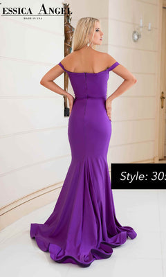 A woman stands indoors with her back to the camera, wearing the Cut-Out Long Prom Dress: Jessica Angel 305—a fitted, floor-length, off-the-shoulder purple gown.