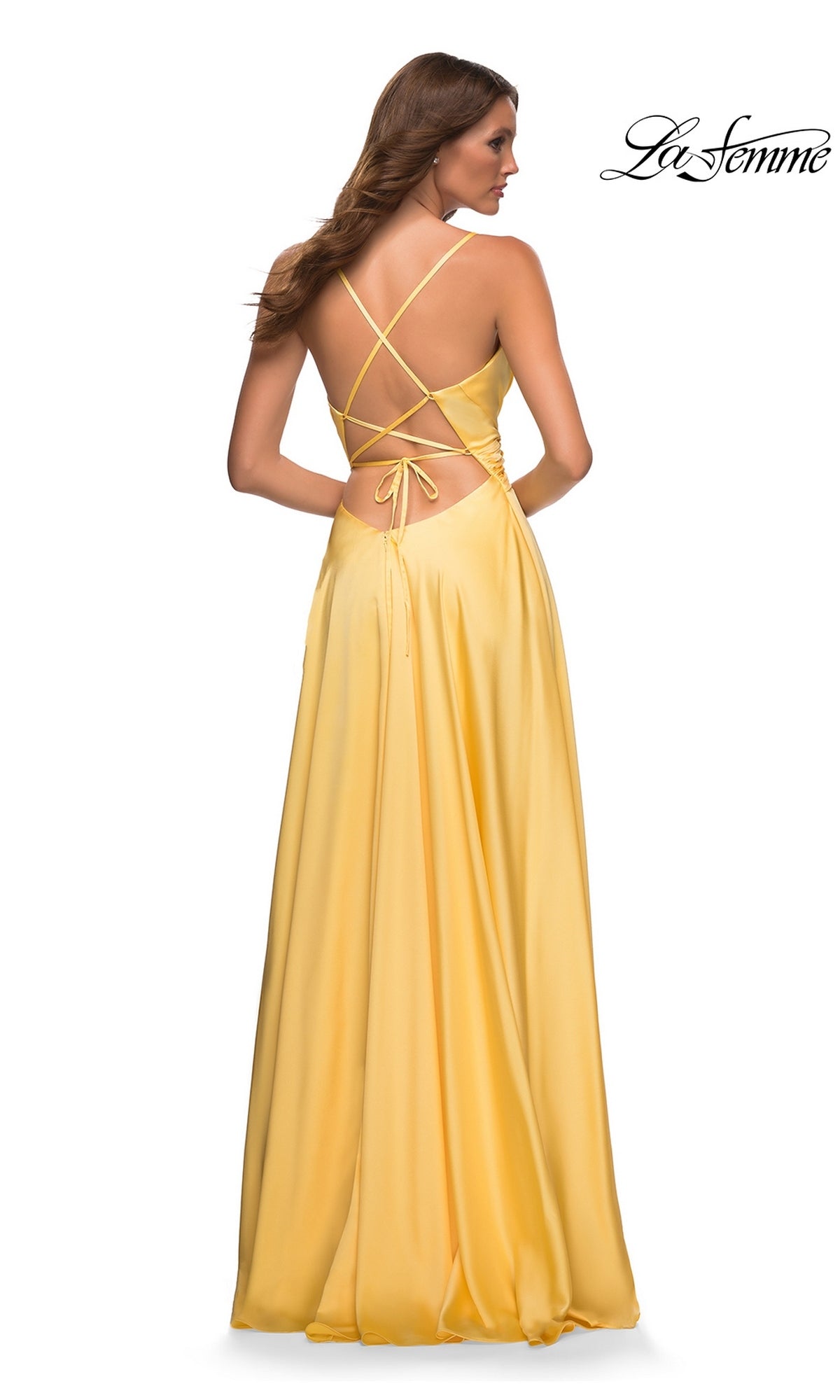 Back view of the Long Prom Dress: La Femme 30662, a floor-length yellow satin A-line gown featuring a lace-up open back and thin spaghetti straps.