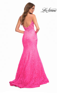 A back view of the La Femme 30663 long prom dress, a floor-length hot pink floral lace gown featuring spaghetti straps and an open back.