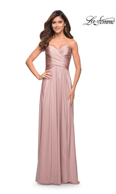Woman in Long Prom Dress: La Femme 30700—strapless, dusty rose jersey with ruched bodice, sweetheart neckline, and high-leg slit. “La Femme” shown top right.