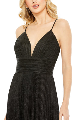 Woman wearing the Pleated Empire-Waist Long A-Line Prom Dress 30725, a black sleeveless gown with thin straps, V-neckline, fitted pleated bodice, and elegant silhouette by Mac Duggal.