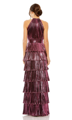 A woman with an elegant updo faces away, wearing the High-Neck Long Metallic Tiered Formal Dress 30763 in magenta, featuring a sleeveless design and multiple pleated floor-length ruffle tiers.