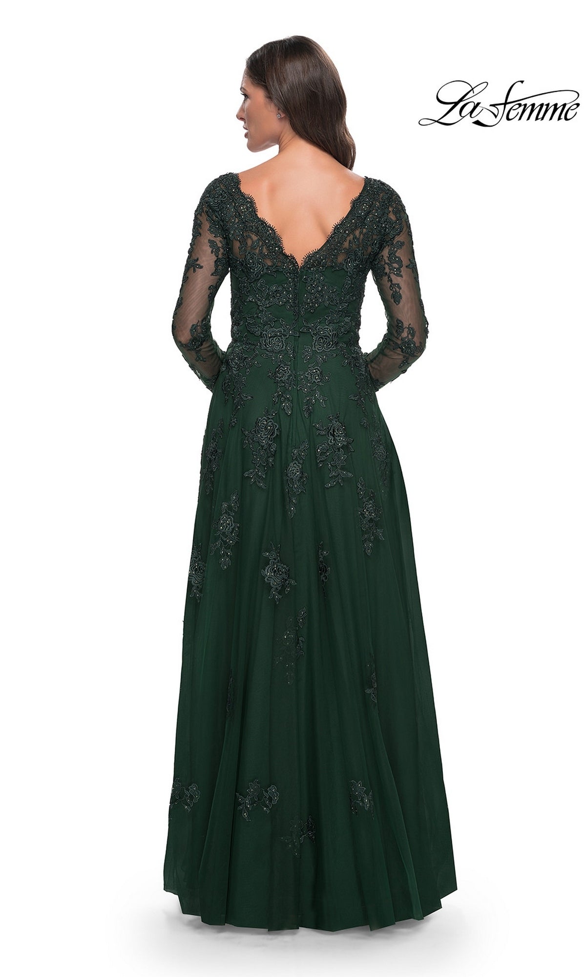 Back view of the Long Formal Dress: La Femme 30795, a floor-length, dark green gown with a tulle A-line skirt, long lace sleeves, and beaded lace appliques on the bodice and skirt.