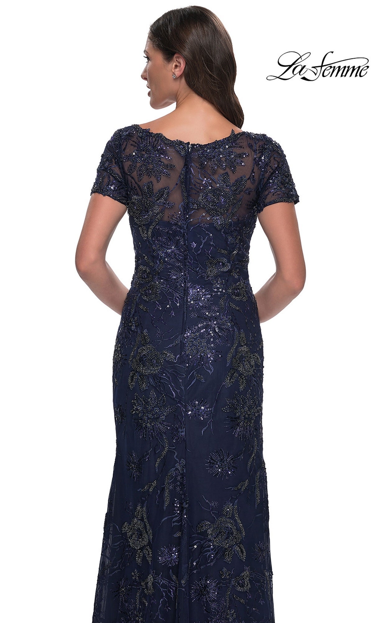 Back view of the Long Formal Dress: La Femme 30798, a navy blue short-sleeved, long formal dress with floral embroidery and sequin embellishments.