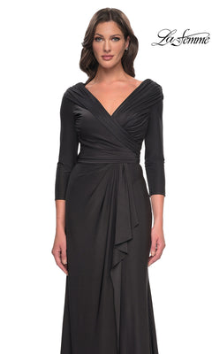 A long, black La Femme 30845 jersey formal dress with a V-neckline, draped bodice, and three-quarter length sleeves.