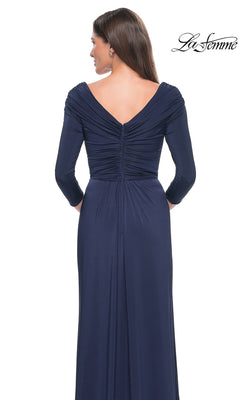 Back view of the floor-length navy blue La Femme 30845 jersey formal dress, featuring a V-neck, ruched bodice, and three-quarter length sleeves.