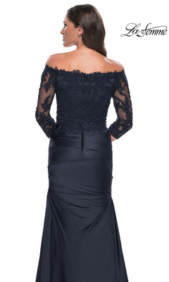Back view of the Long Formal Dress: La Femme 30853, an off-the-shoulder gown with a lace bodice, three-quarter length sleeves, and a floor-length trumpet skirt.