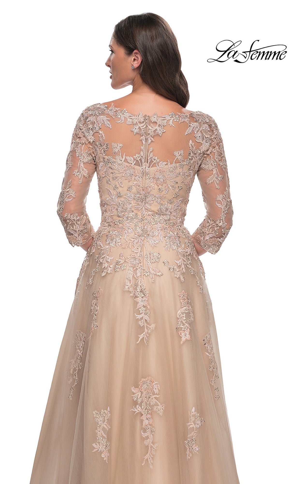 Back view of the Long Formal Dress: La Femme 30859 in nude-champagne, featuring three-quarter sleeves and an ornate floral lace appliqué gown overlay.